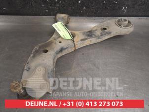 Toyota Prius Plus Querlenker unten links vorne O489668 foto 2