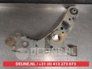 Toyota Prius Plus Querlenker unten links vorne O489668 foto 3