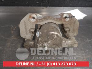 Toyota Prius Plus Rear brake calliper, left O489679 photo 2