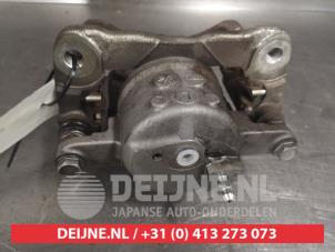 Toyota Prius Bremszange links vorne O490378 foto 2