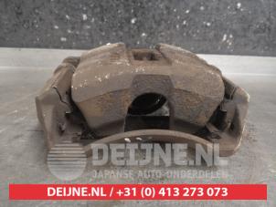 Honda FR-V Front brake calliper, left O491496 foto 3