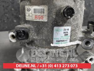 Kia Carens Klimapumpe O492987 foto 3