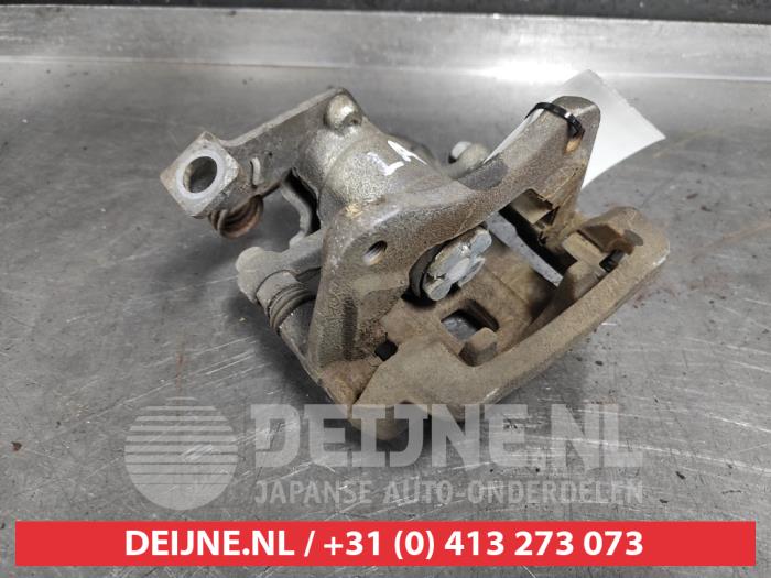 Kia Carens Remklauw (Tang) links-achter O493030