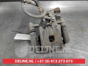 Kia Carens Bremszange links hinten O493030 foto 2