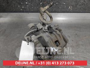 Kia Carens Rear brake calliper, right O493031 photo 2