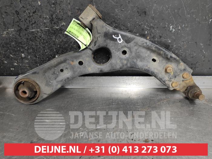 Kia Carens Draagarm onder rechts-voor O493033