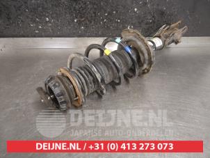 Kia Rio Schokdemperpoot links-voor O494873 foto 2
