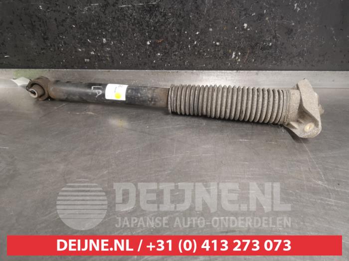 Kia Sportage Schokdemper links-achter O495080