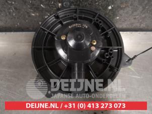 Mazda 323F Kachel Ventilatiemotor O495322 foto 2