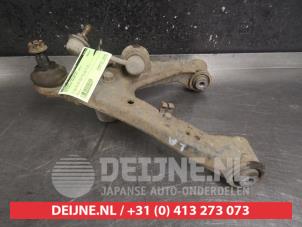 Mitsubishi Pajero Draagarm links-achter O495671 foto 2