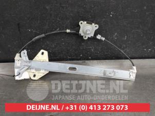 Honda Jazz Fenstermechanik 4-türig links hinten O495744 foto 2