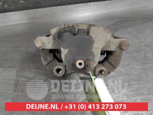 Nissan Primera Bremszange links vorne O496126 foto 3