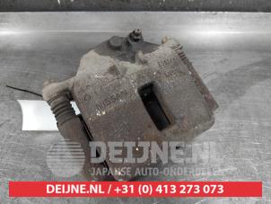 Nissan Primera Bremszange links vorne O496126 foto 2