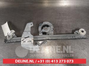 Toyota Aygo Window mechanism 4-door, front left O496944 photo 2
