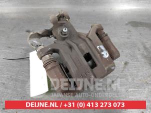 Hyundai IX20 Rear brake calliper, left O497271 photo 2