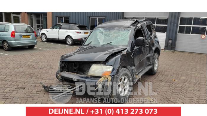 Mitsubishi Pajero Mistlamp links-voor O497279