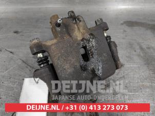 Mitsubishi Pajero Bremszange links hinten O497343 foto 2