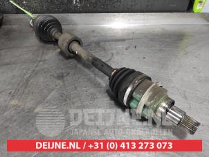 Daihatsu Sirion Aandrijfas links-voor O497755 foto 2