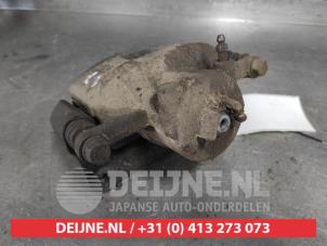 Subaru Legacy Bremszange links vorne O498435 foto 3