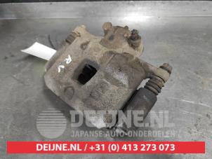 Subaru Legacy Front brake calliper, right O498436 photo 2