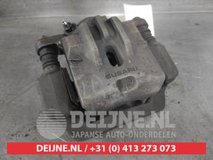 Subaru XV Rear brake calliper, left O501774 photo 2