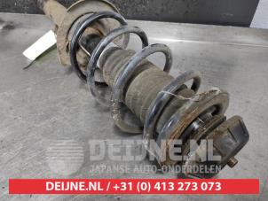 Toyota Aygo Front shock absorber rod, left O502527 photo 2