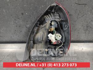 Toyota Corolla Rücklicht links O502905 foto 3