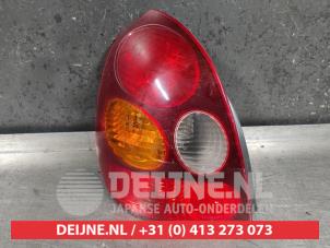 Toyota Corolla Rücklicht links O502905 foto 2