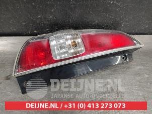 Subaru Justy Taillight, left O503389 photo 2