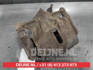Toyota Corolla Bremszange links vorne O503645 foto 2