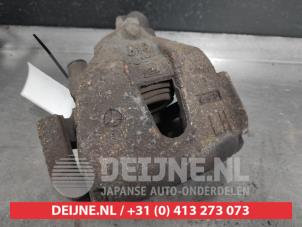 Mazda 3 Front brake calliper, left O504208 photo 2