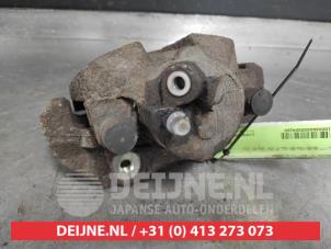 Mazda 3 Front brake calliper, left O504208 photo 3