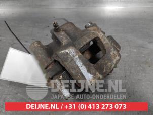 Toyota Camry Bremszange links hinten O505069 foto 2