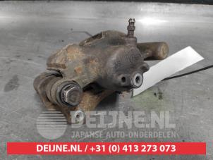 Toyota Camry Bremszange links hinten O505069 foto 3