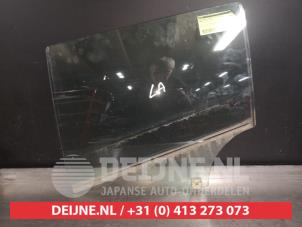 Mazda 3 Rear door window 4-door, left O505122 photo 2