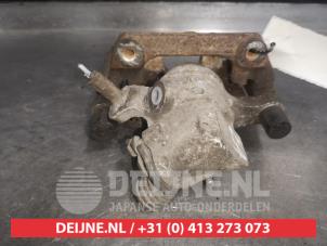 Mazda 3 Bremszange links hinten O505656 foto 2