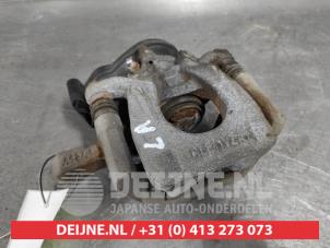 Nissan X-Trail Bremszange links hinten O506128 foto 2