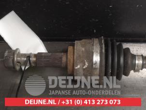 Nissan Micra Antriebswelle links vorne O506396 foto 2