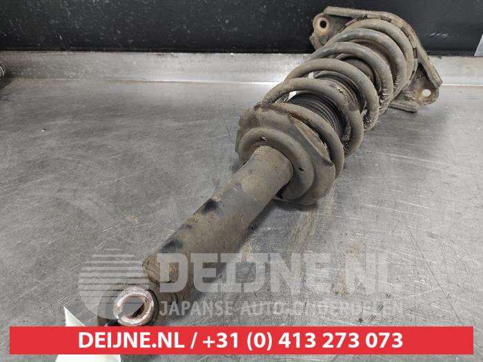 Nissan Almera Rear shock absorber rod, left O507054