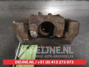Ssang Yong Korando Bremszange links hinten O507401 foto 3
