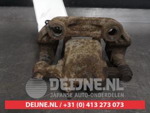 Ssang Yong Korando Bremszange links hinten O507401 foto 2