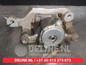 Nissan Leaf Remklauw (Tang) links-achter O509085 foto 2