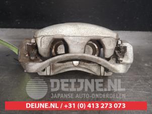 Nissan Leaf Remklauw (Tang) links-voor O509098 foto 3