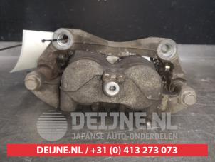Nissan Leaf Remklauw (Tang) links-voor O509098 foto 2