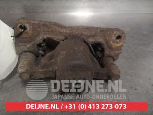 Subaru Forester Remklauw (Tang) links-achter O510603 foto 2