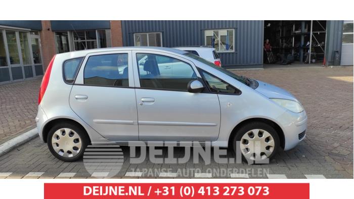 Mitsubishi Colt Portierruit 4Deurs rechts-achter O510996
