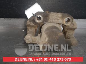 Ssang Yong Rexton Rear brake calliper, left O511023 photo 2