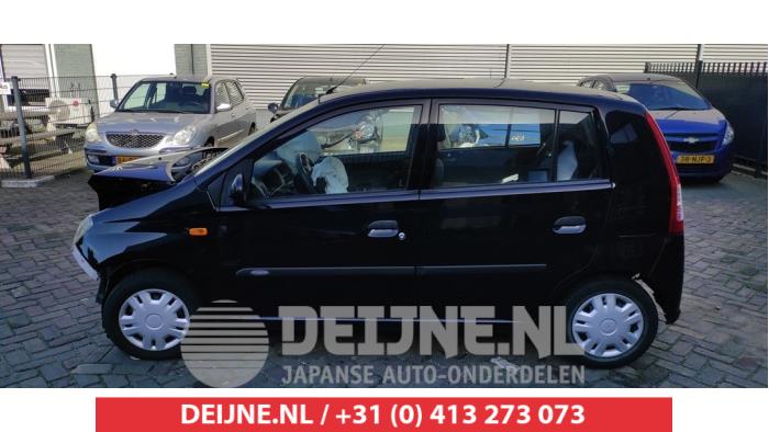 Daihatsu Cuore Portierruit 4Deurs links-achter O513040
