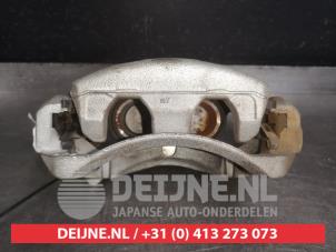 Nissan Leaf Remklauw (Tang) rechts-voor O514063 foto 3