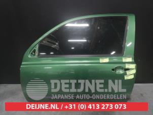 Gebruikte Deur 2Deurs links Nissan Micra (K12) 1.2 16V Prijs € 75,00 Margeregeling aangeboden door V.Deijne Jap.Auto-onderdelen BV